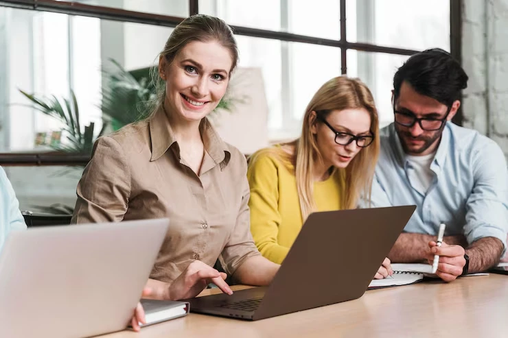 professionl ateam in office for leads on laptops